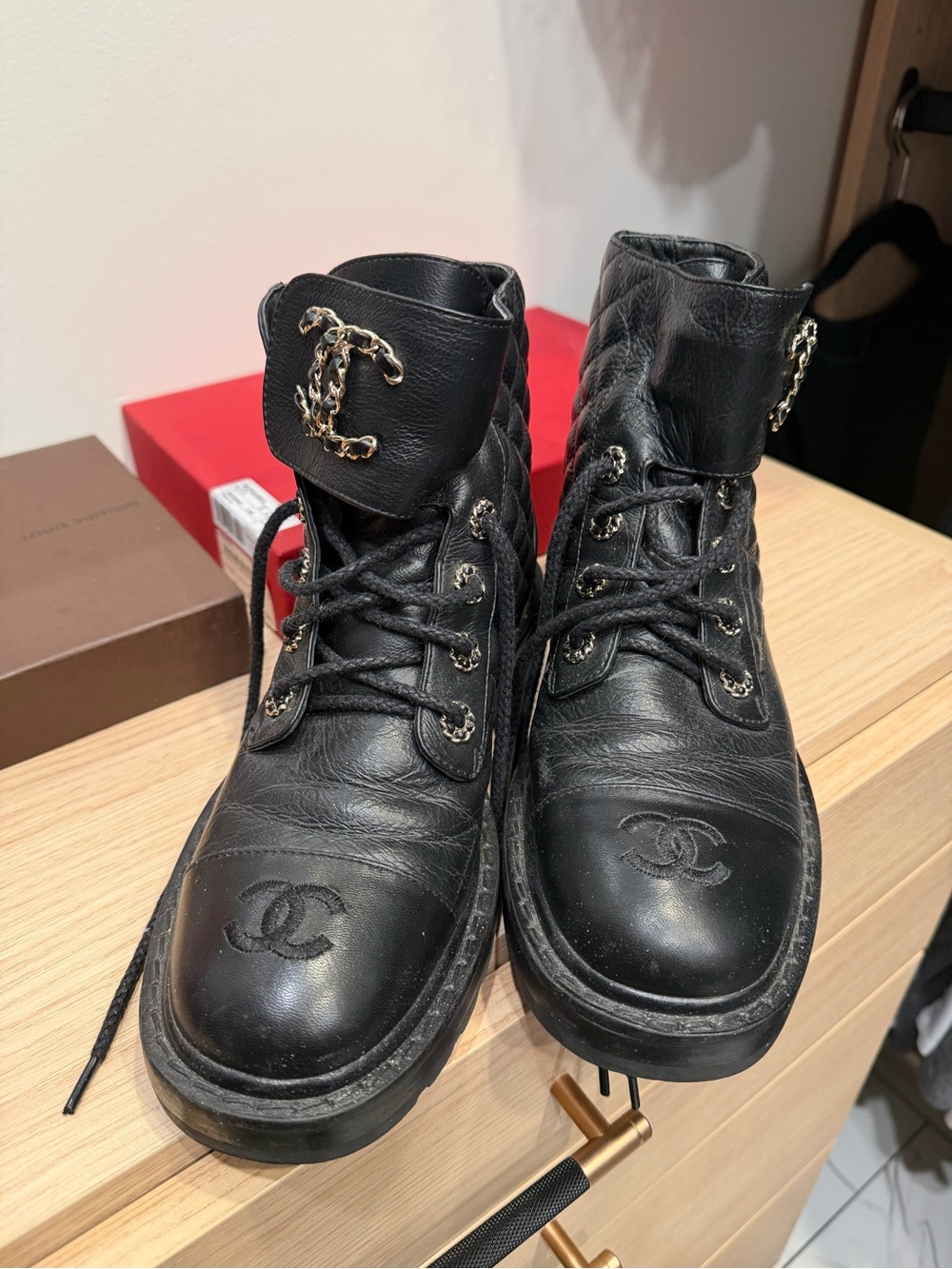 CHANEL Black Quilted Leather Combat Boots with Gold Logo Insole